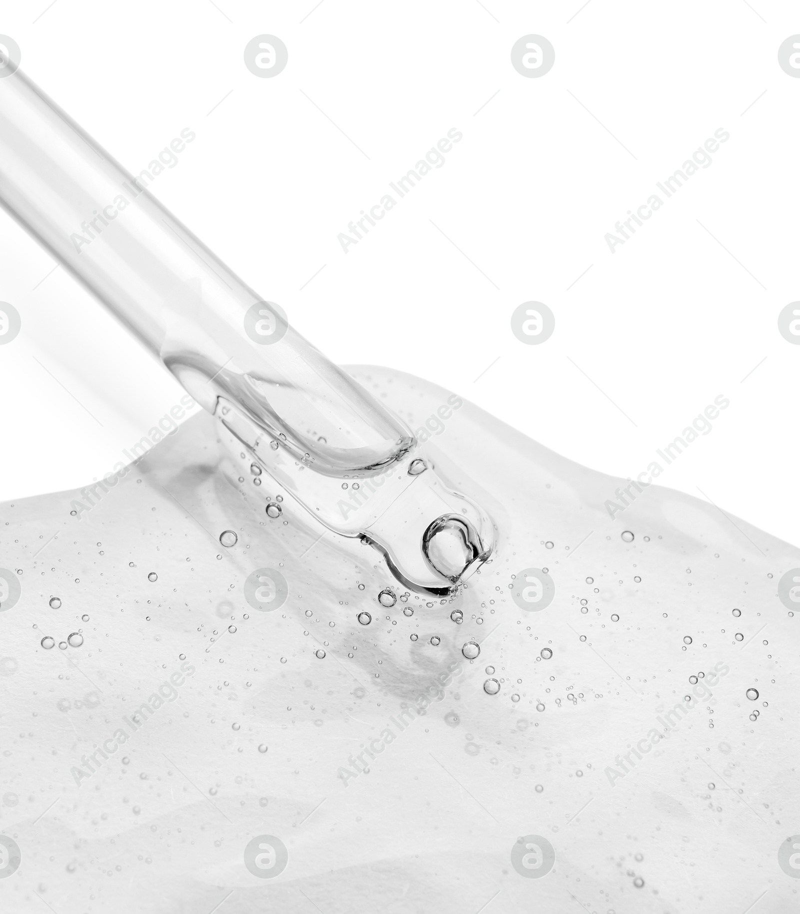 Image of Dropper with clear cosmetic oil on white background