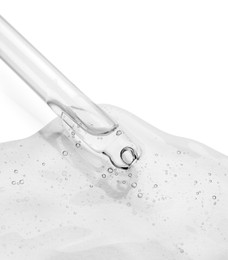 Image of Dropper with clear cosmetic oil on white background