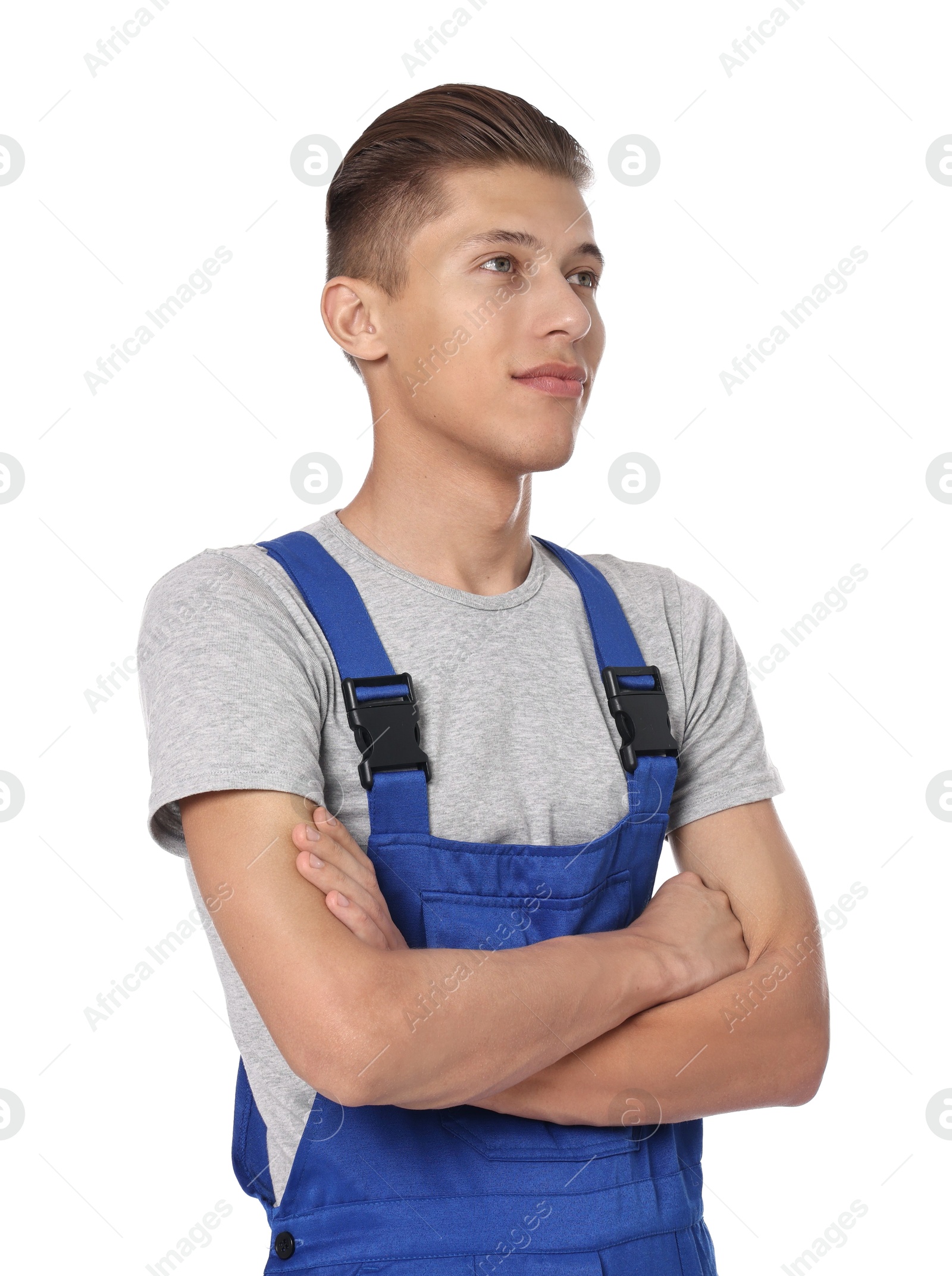 Photo of Auto mechanic with crossed arms on white background