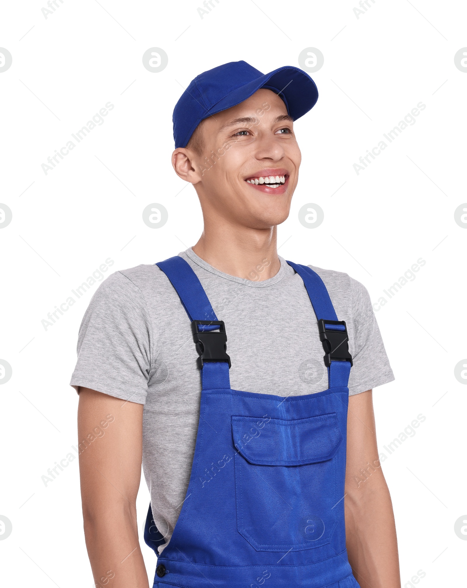 Photo of Smiling auto mechanic in uniform on white background