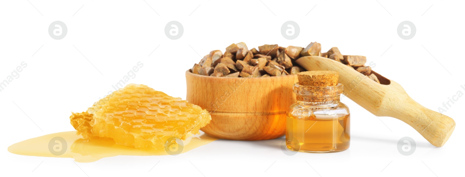 Photo of Natural honey tincture, propolis granules and sweet honeycomb isolated on white