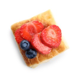 Tasty puff pastry with berries isolated on white, top view