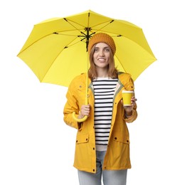 Woman with yellow umbrella and paper cup on white background