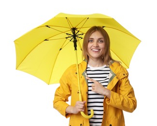 Photo of Woman with yellow umbrella pointing at something on white background