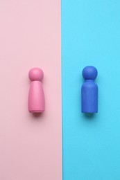 Gender equality concept. Male and female figures on color background, flat lay