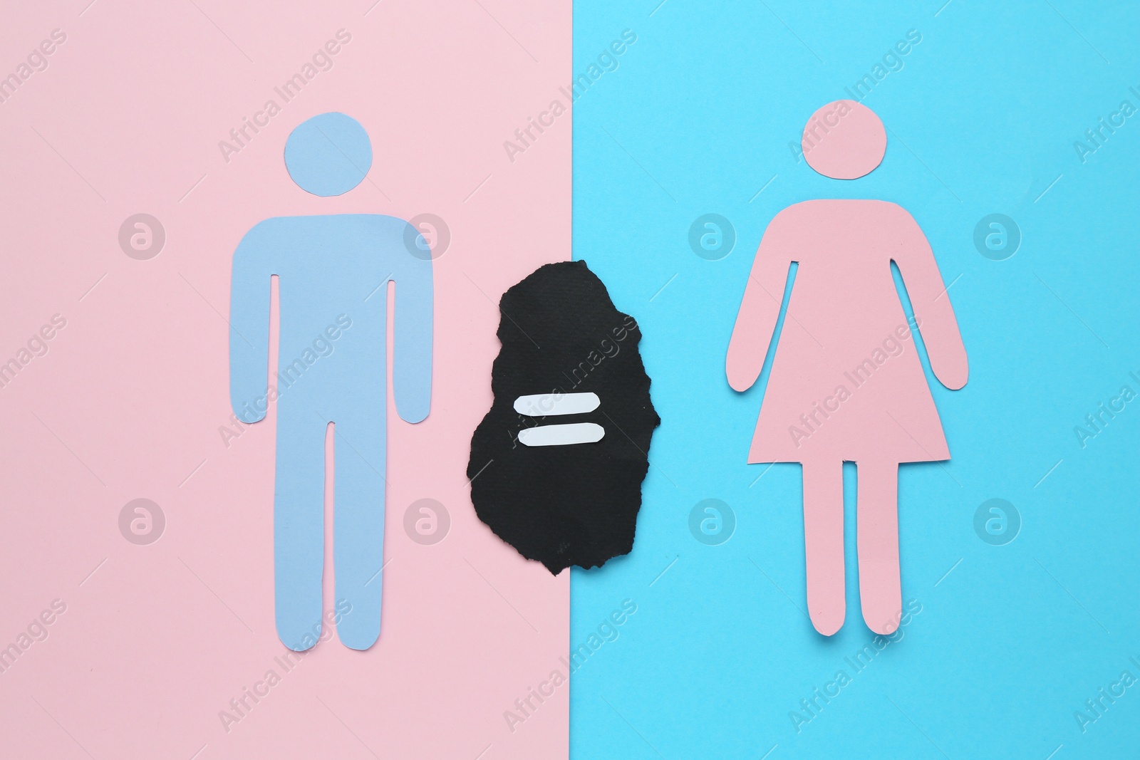 Photo of Gender equality concept. Male and female figures on color background, flat lay