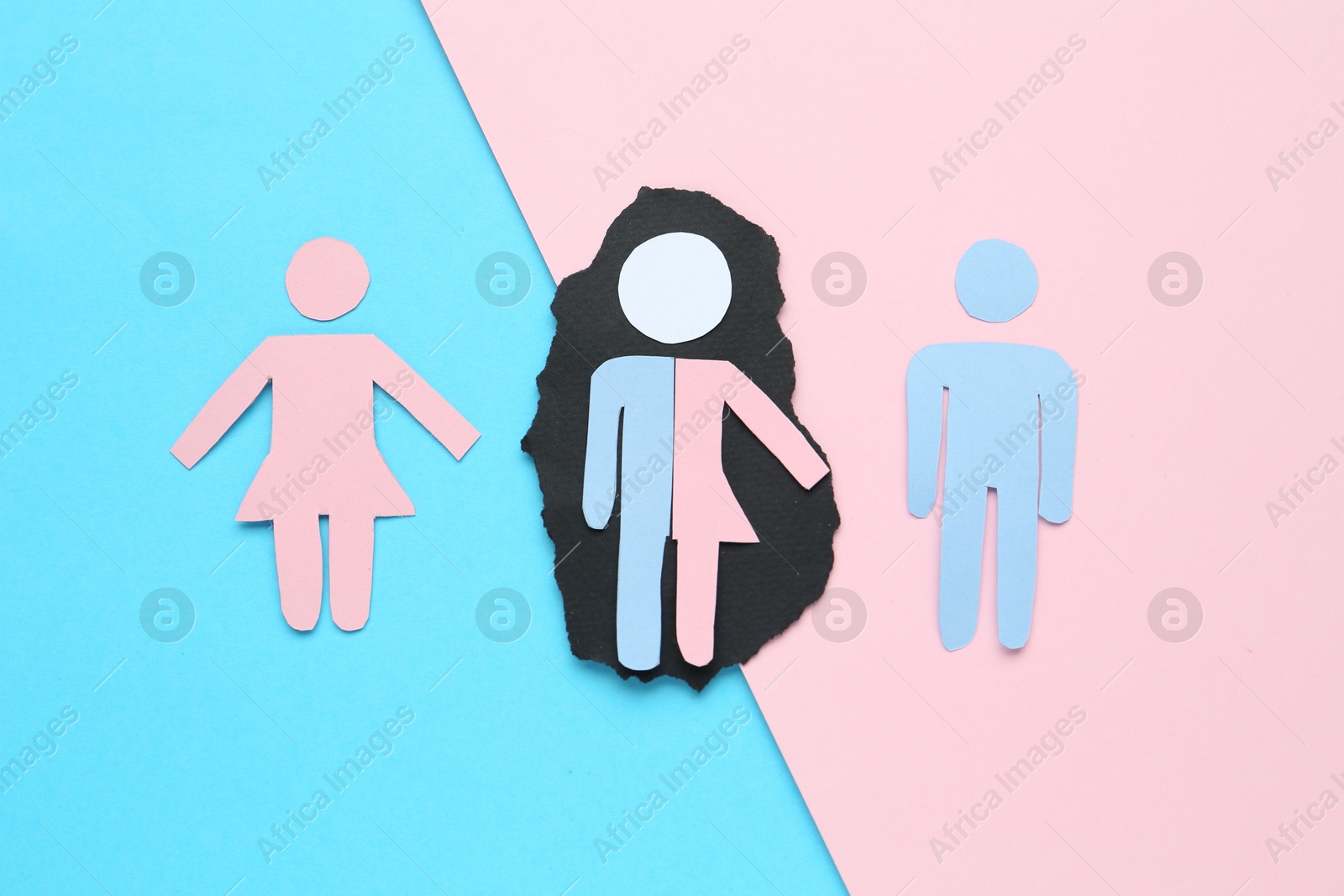 Photo of Gender equality concept. Male and female figures on color background, flat lay