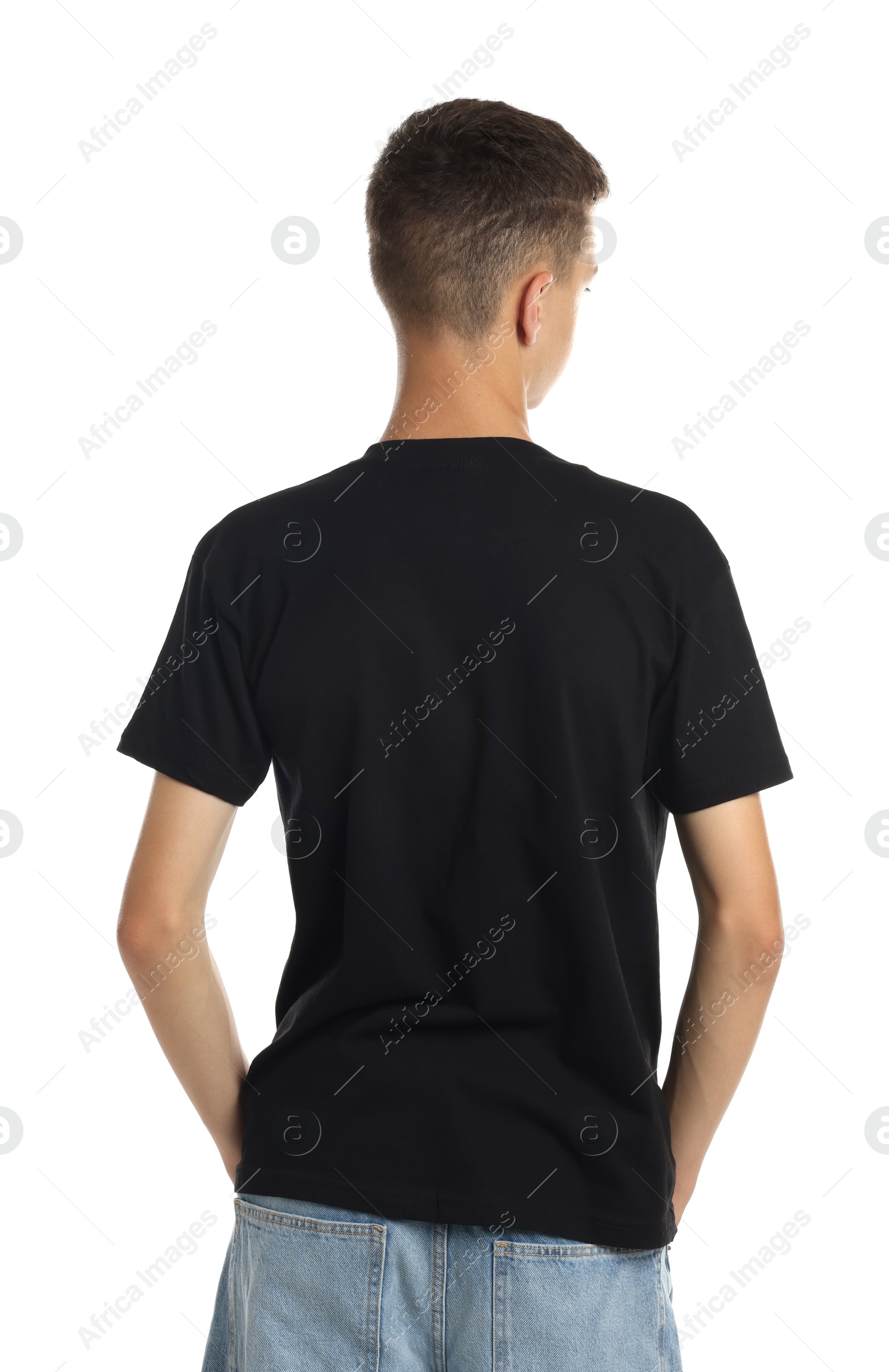 Photo of Teenage boy wearing black t-shirt on white background, back view