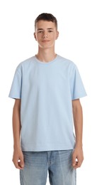 Teenage boy wearing light blue t-shirt on white background