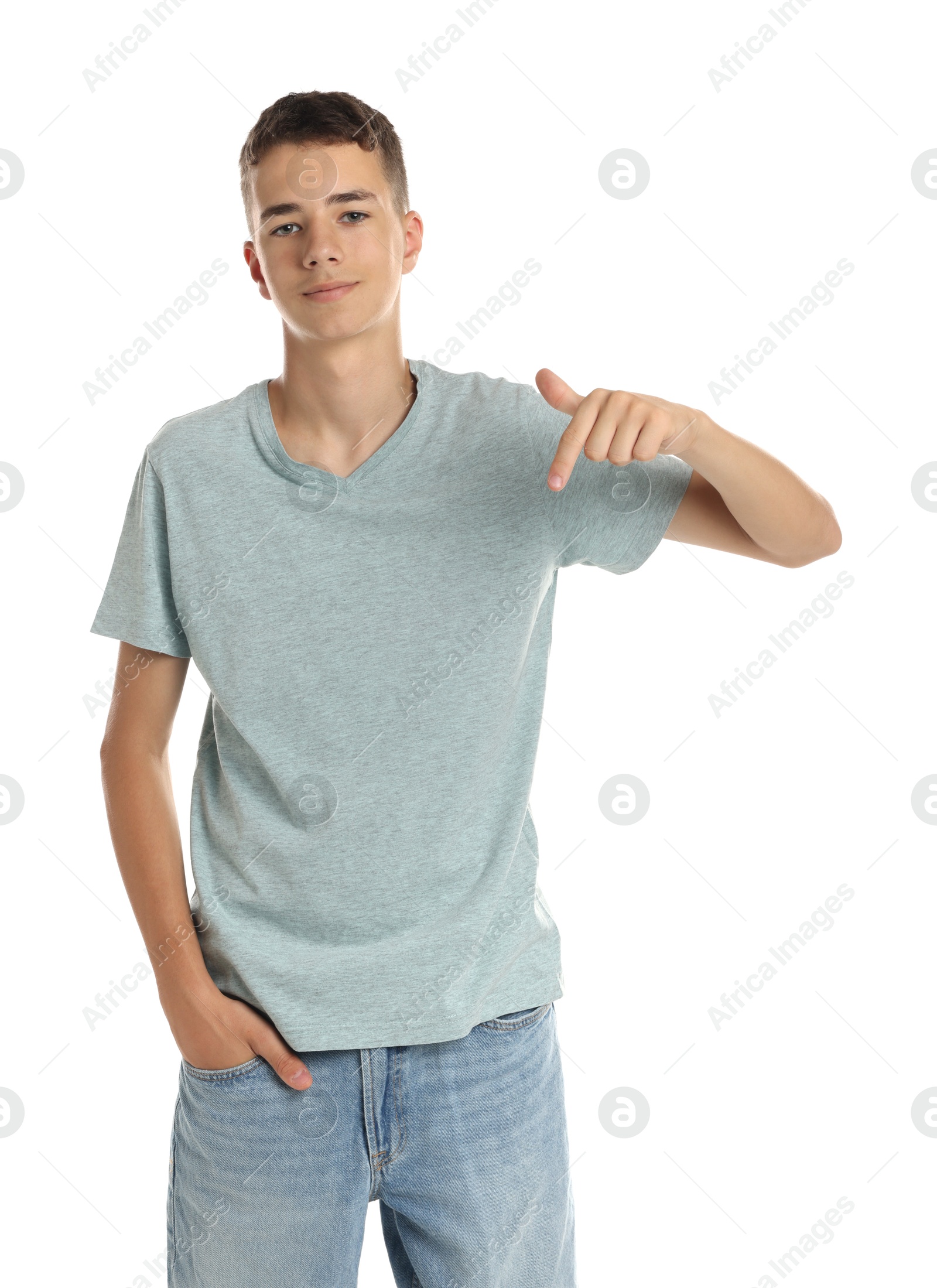 Photo of Teenage boy wearing light grey t-shirt on white background