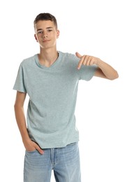 Photo of Teenage boy wearing light grey t-shirt on white background