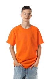 Photo of Teenage boy wearing orange t-shirt on white background