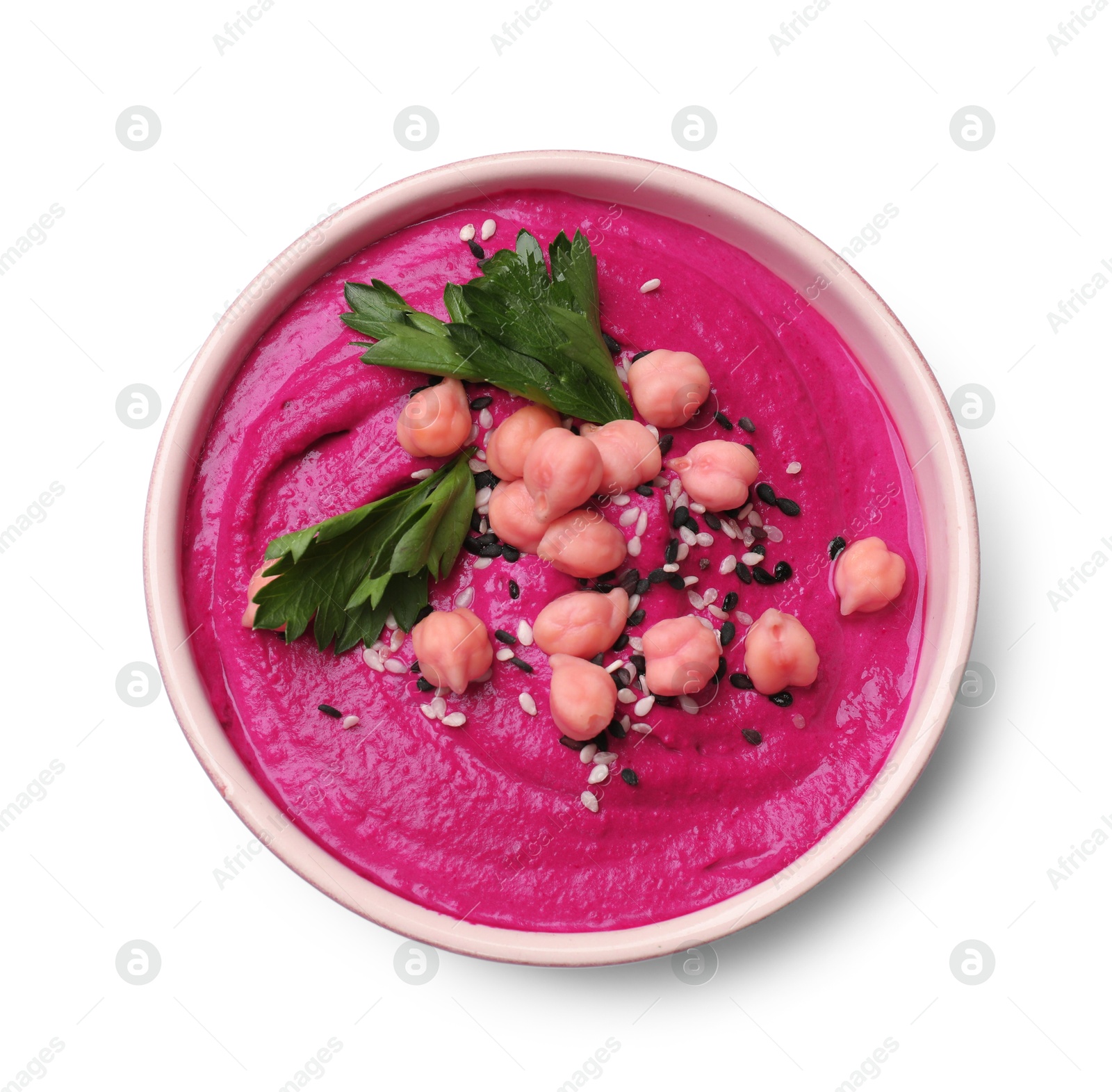 Photo of Tasty beetroot hummus, parsley and chickpeas in bowl isolated on white, top view