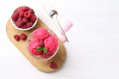 Photo of Delicious raspberry sorbet, mint and fresh berries on white wooden table, top view. Space for text