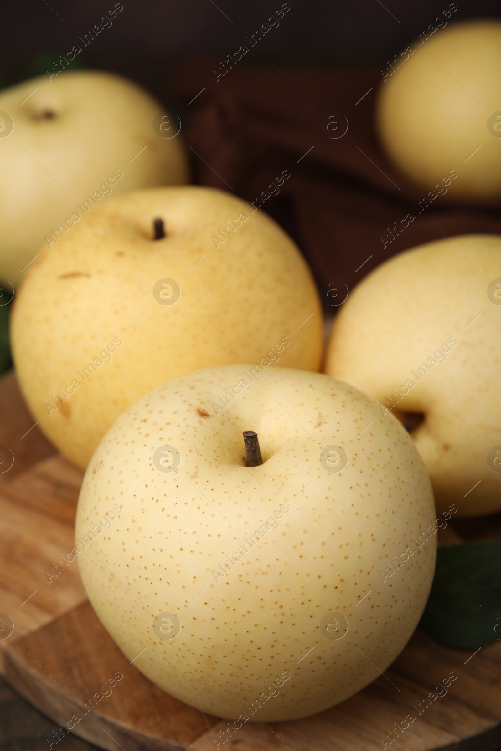 Photo of Delicious fresh apple pears on table, closeup