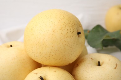 Photo of Delicious fresh apple pears on table, closeup