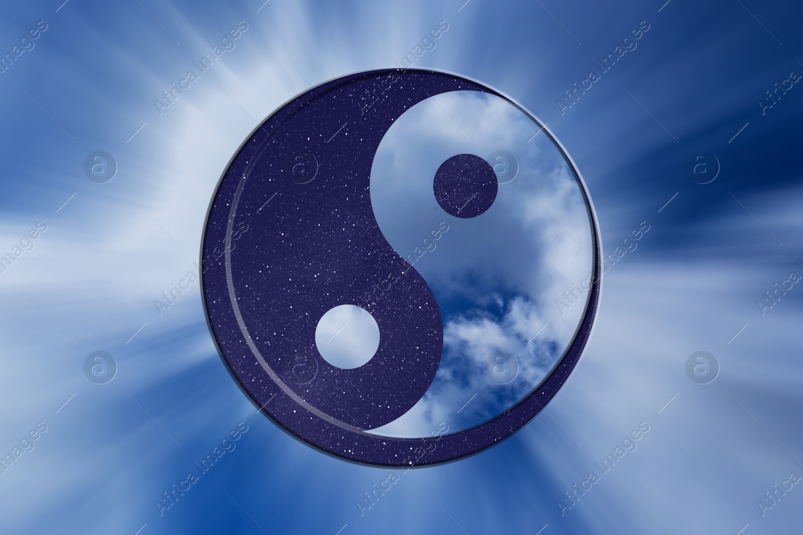 Image of Yin and yang symbol with sky at night and day inside