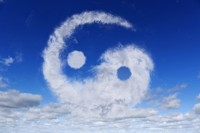 Image of Yin and yang symbol made of clouds in sky