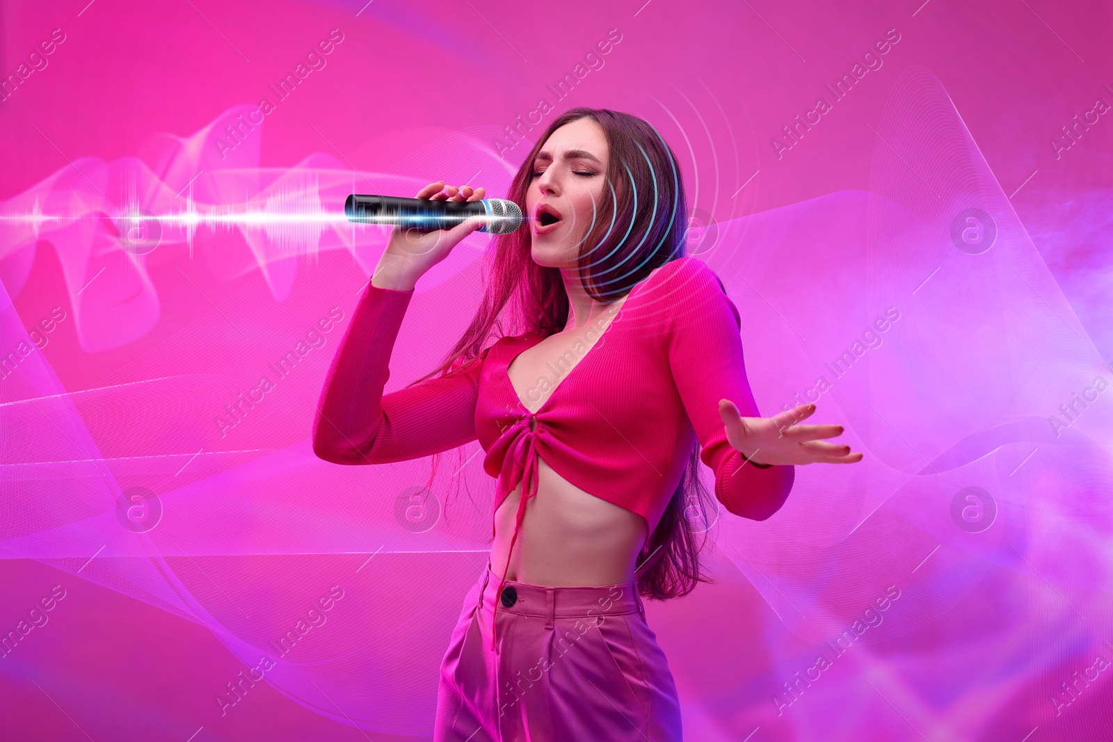 Image of Beautiful woman with microphone singing on pink background. Audio waveforms near her