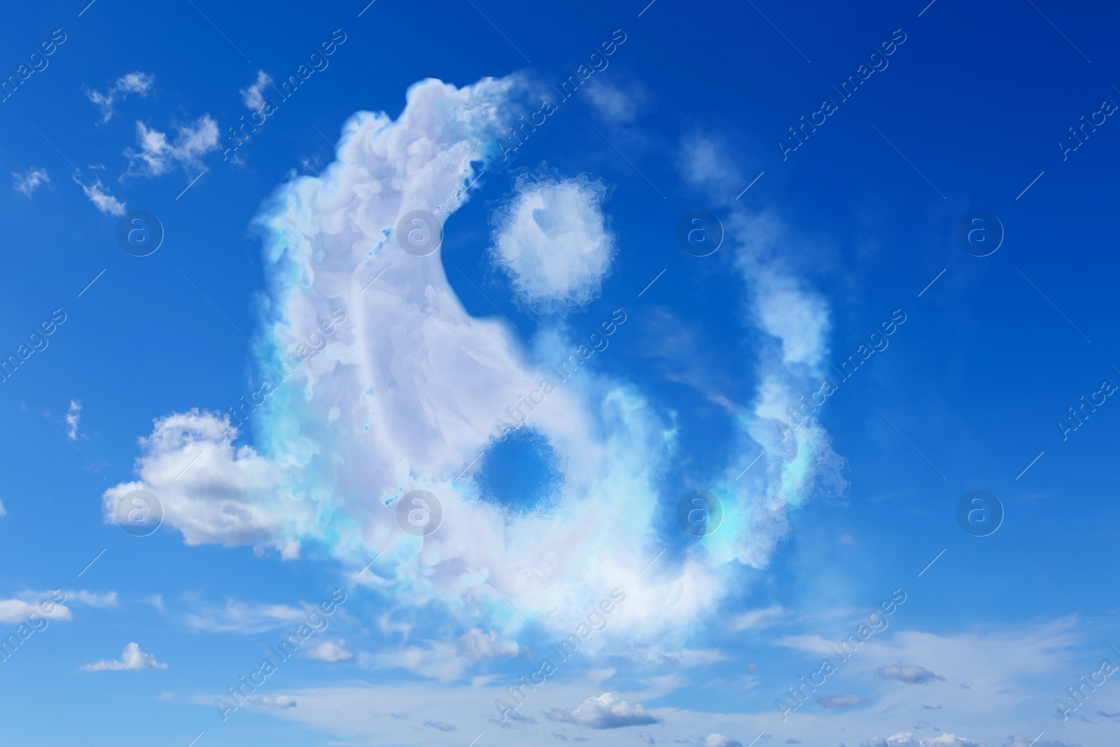 Image of Yin and yang symbol made of clouds in sky