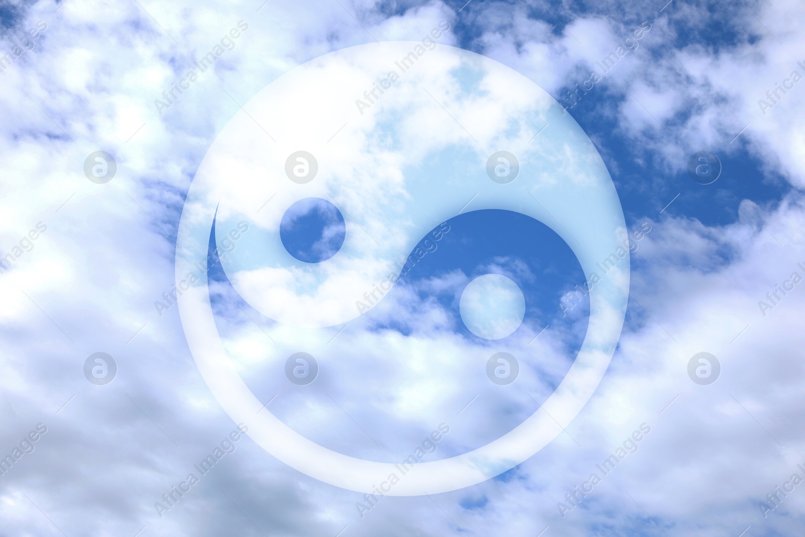 Image of Yin and yang symbol against sky, double exposure