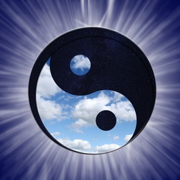 Image of Yin and yang symbol with sky at night and day on blue background