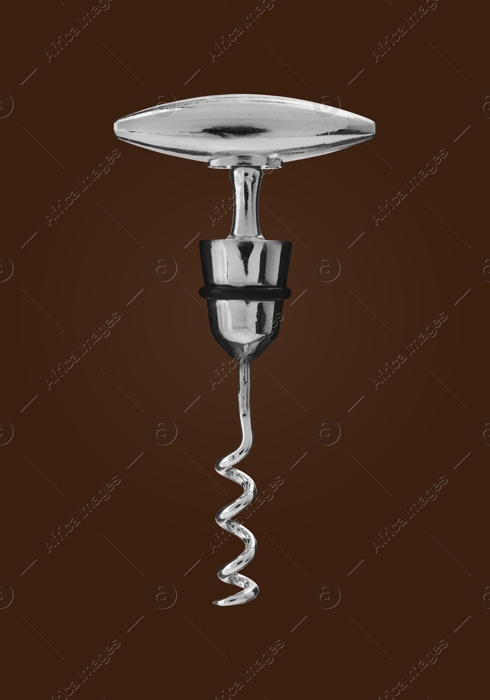 Image of Corkscrew with metallic handle on brown background