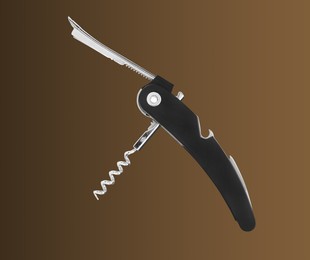 Image of Sommelier knife with corkscrew dark golden gradient background