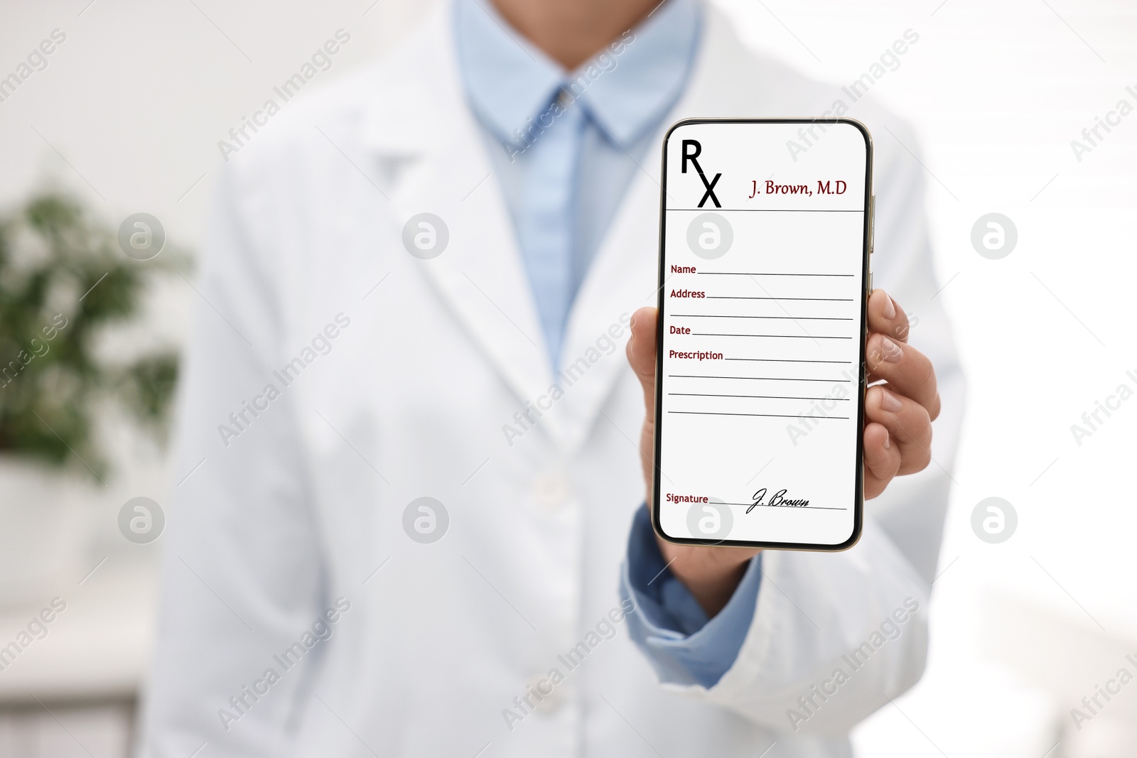 Image of Doctor showing medical prescription on smartphone display in clinic, closeup