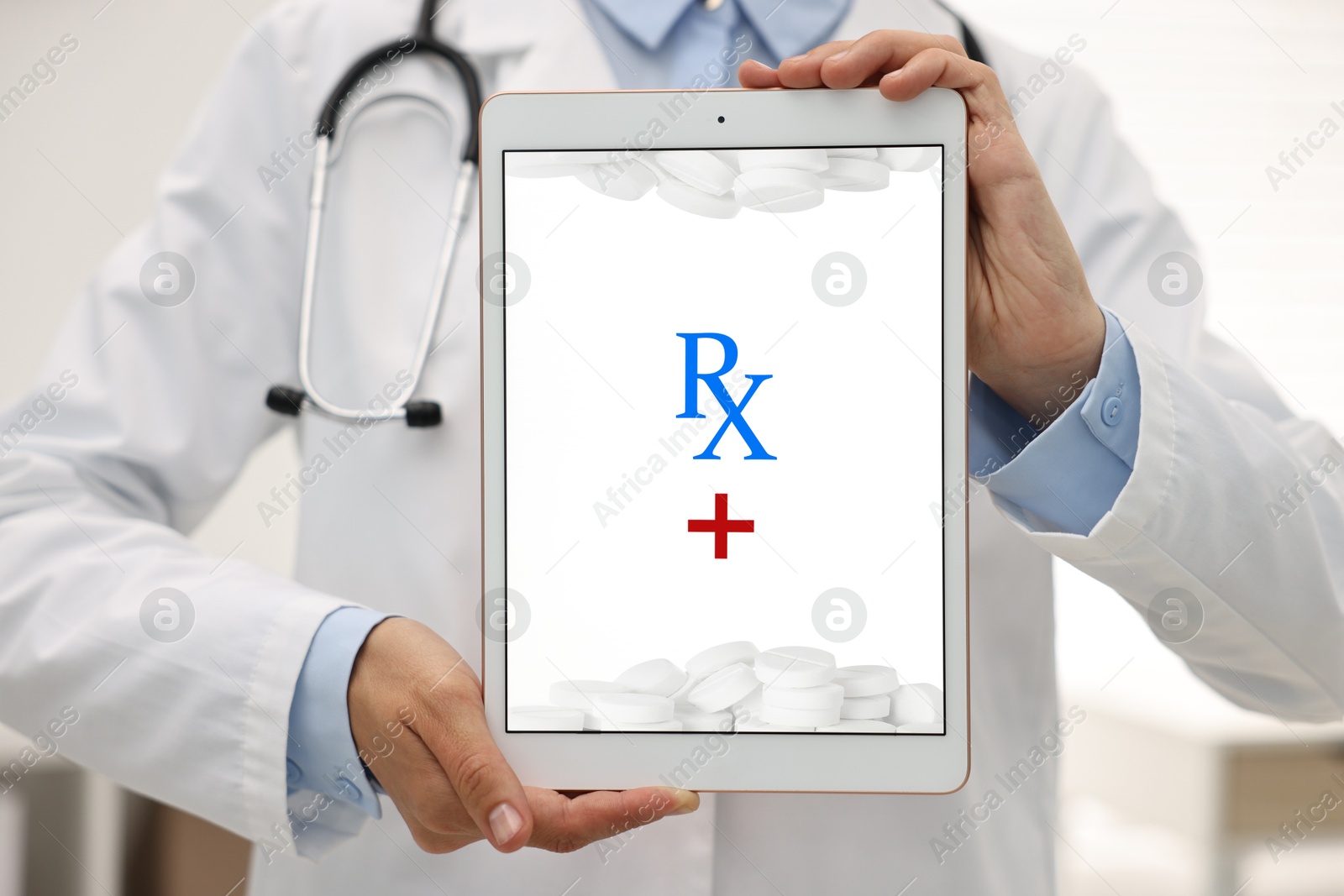 Image of Medical prescription. Doctor showing tablet in clinic, closeup