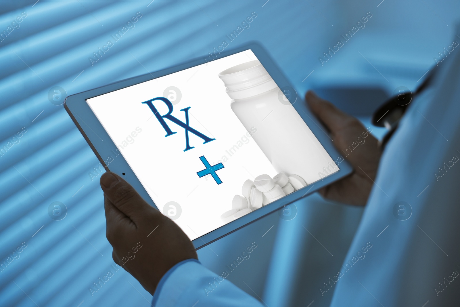 Image of Medical prescription. Doctor working on tablet in clinic, closeup