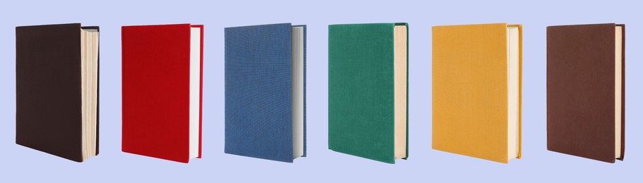 Image of Many books with colorful hardcovers on light blue background, set