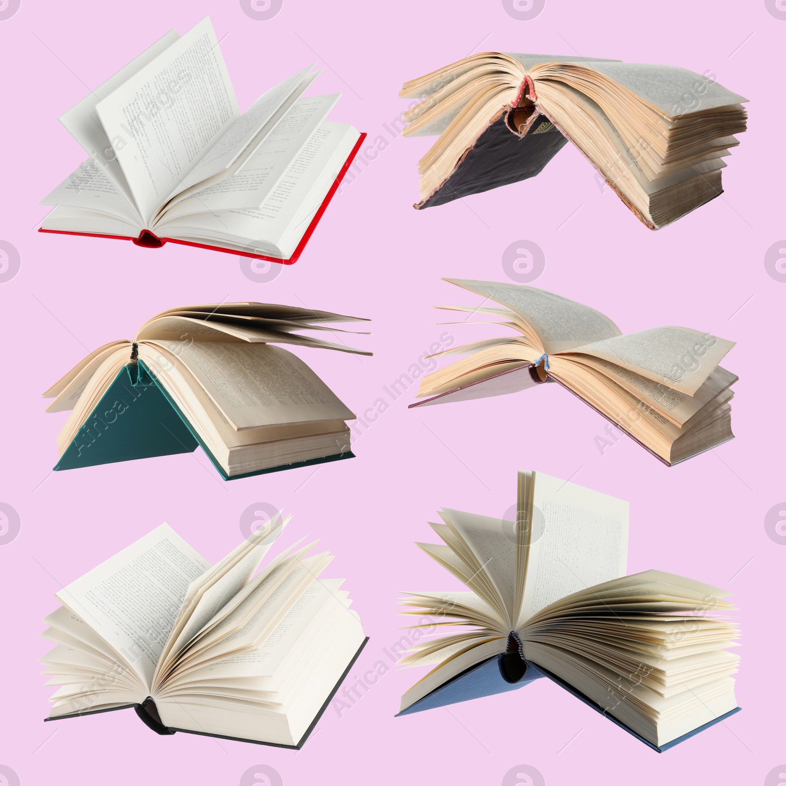 Image of Many different books in air on pink background