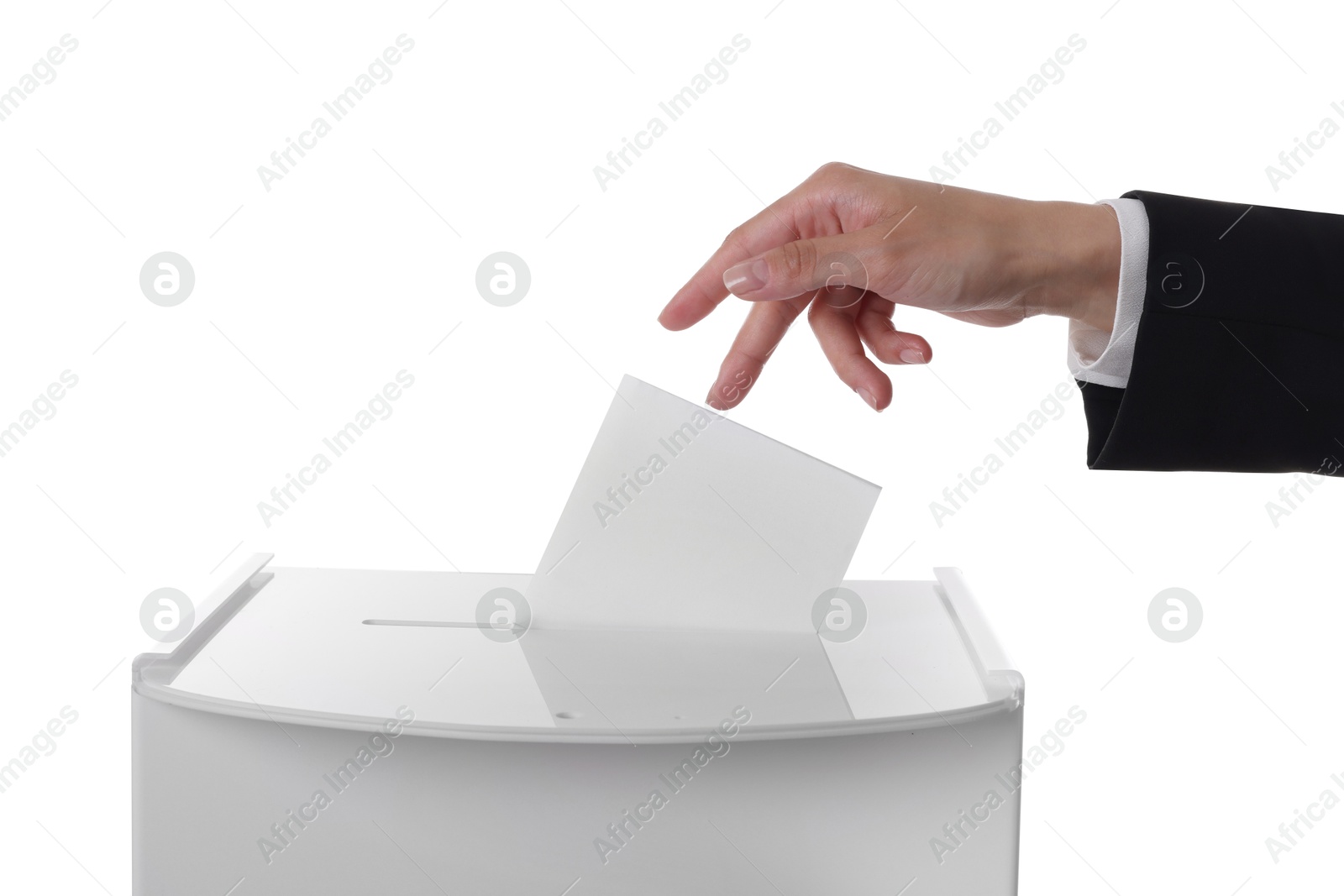 Photo of Woman putting her vote into ballot box against white background, closeup