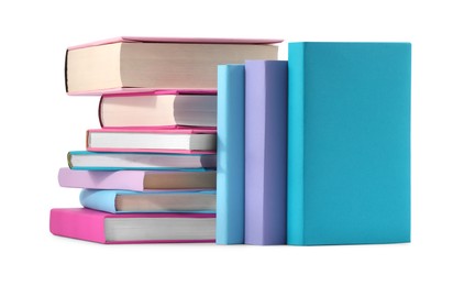 Many bright colorful books isolated on white