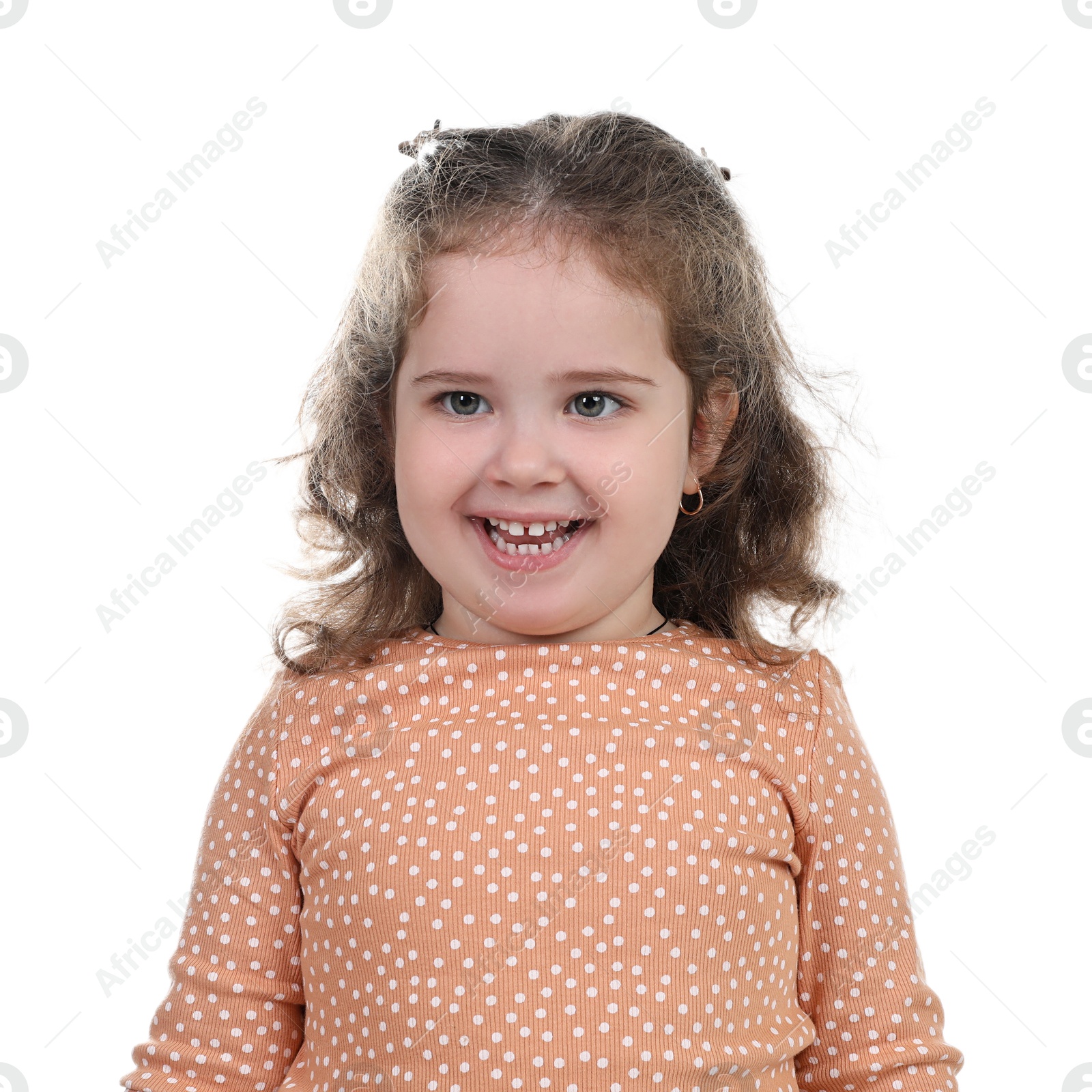 Photo of Portrait of smiling girl on white background. Adorable child