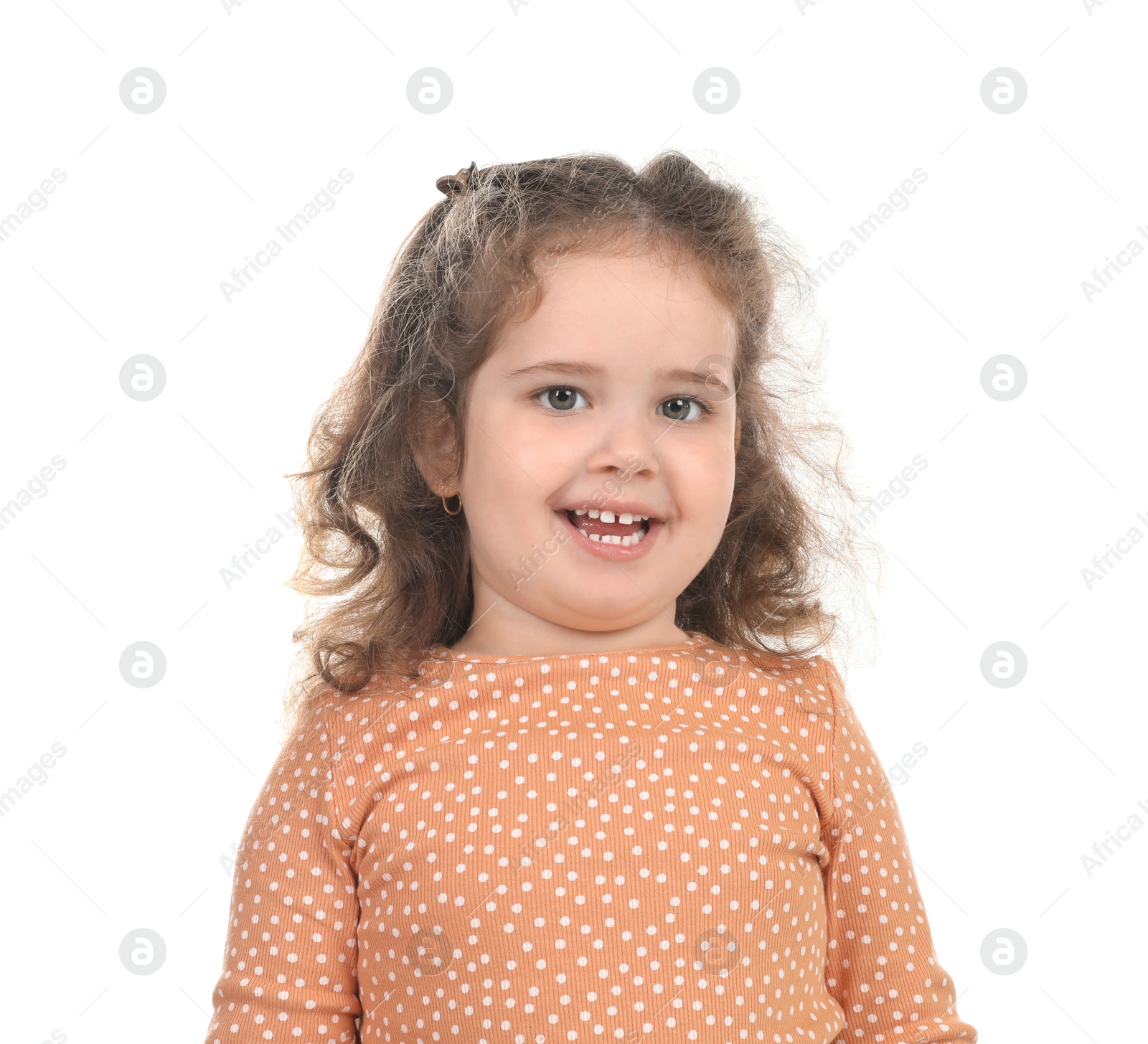 Photo of Portrait of smiling girl on white background. Adorable child