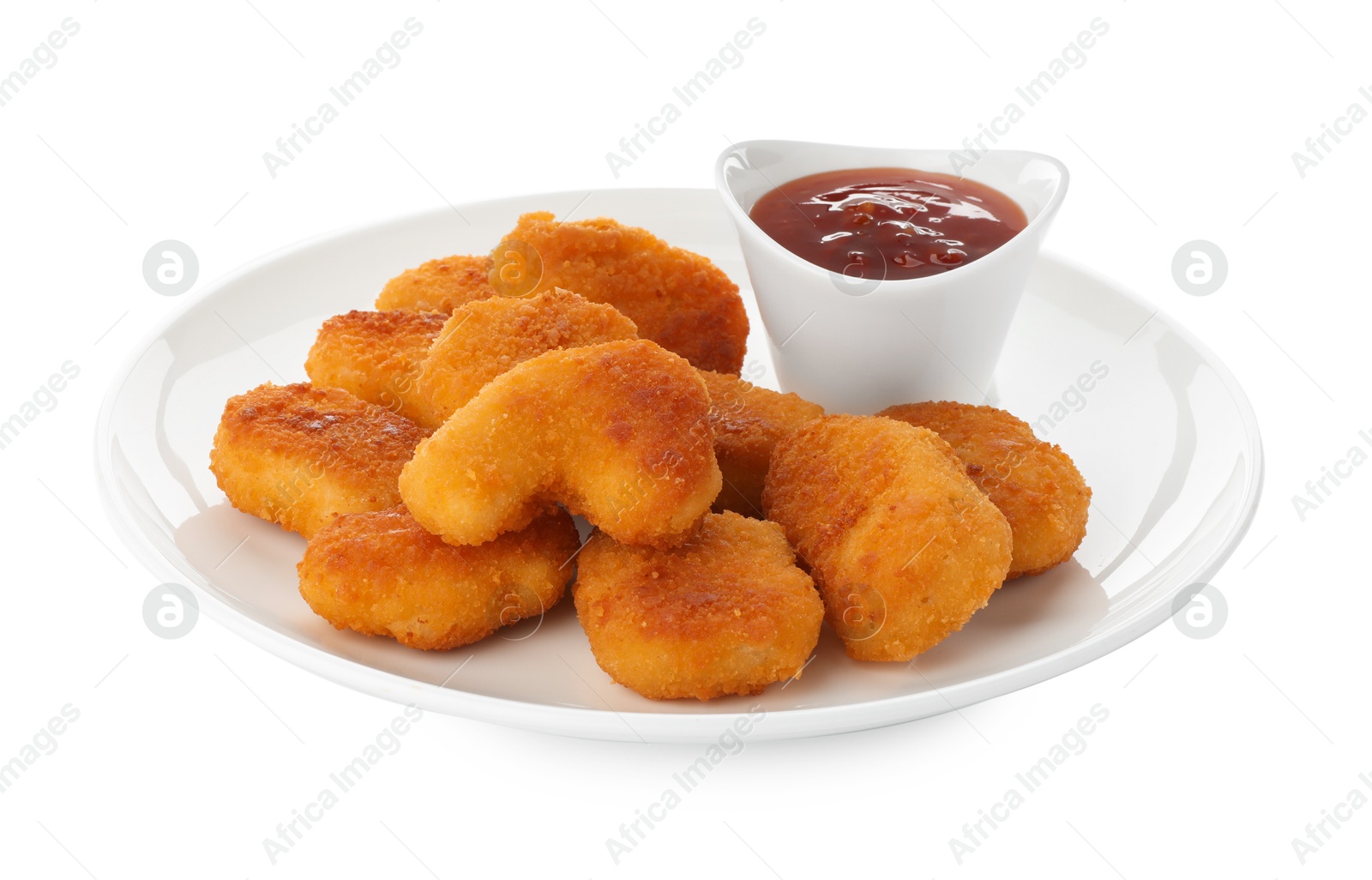 Photo of Tasty chicken nuggets with chili sauce isolated on white