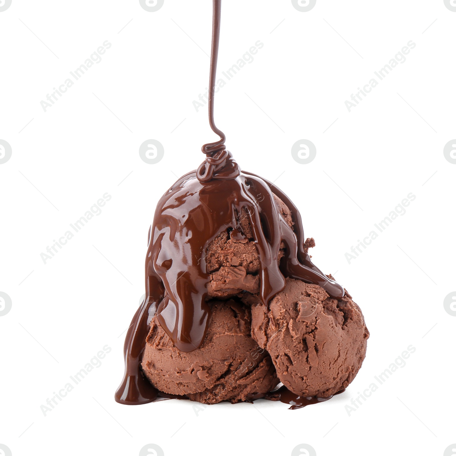 Photo of Pouring melted chocolate onto ice cream isolated on white