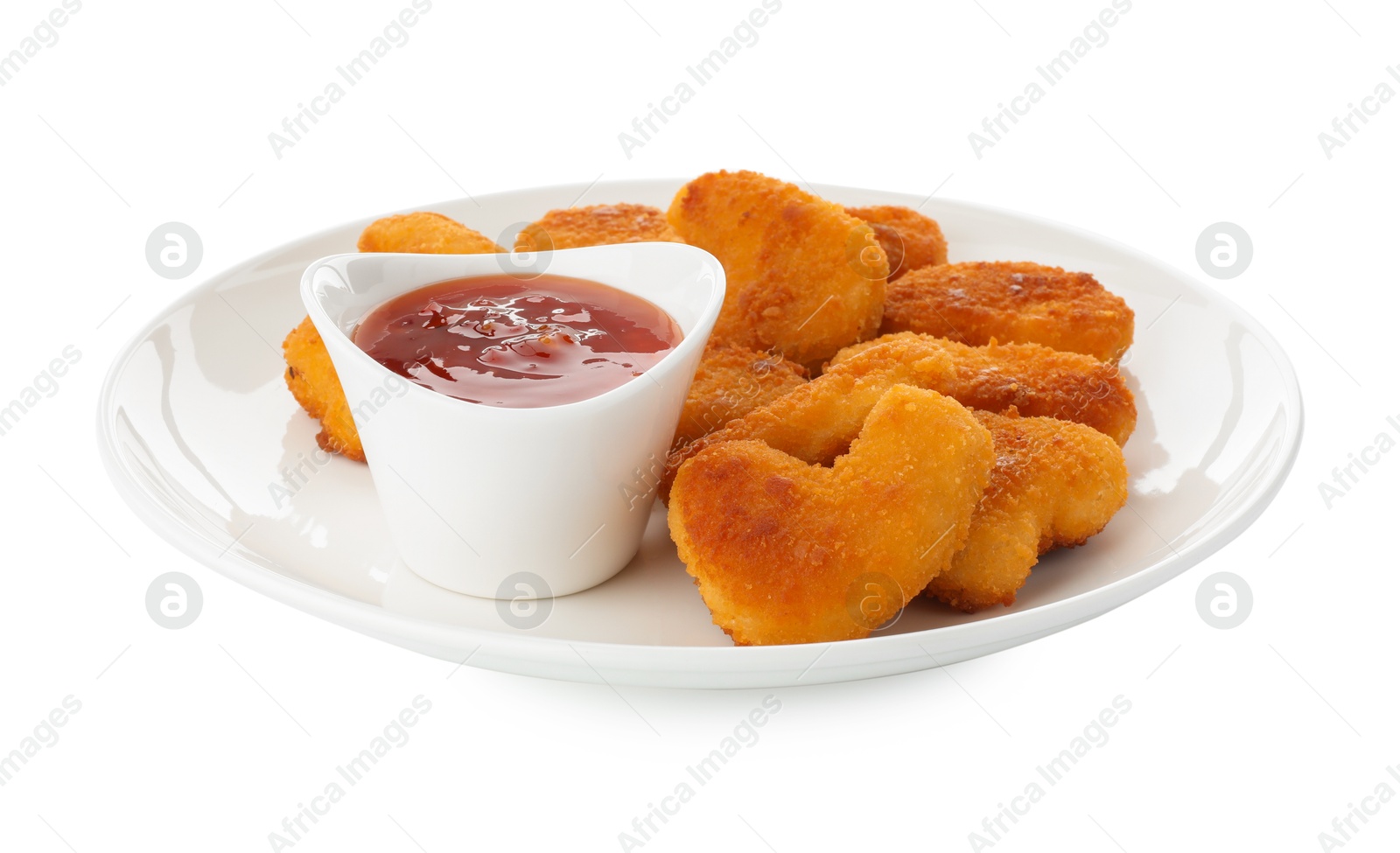 Photo of Tasty chicken nuggets with chili sauce isolated on white