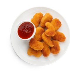 Photo of Tasty chicken nuggets with chili sauce isolated on white, top view