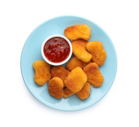 Photo of Tasty chicken nuggets with chili sauce isolated on white, top view