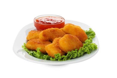 Photo of Tasty chicken nuggets with chili sauce and lettuce isolated on white