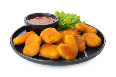 Photo of Tasty chicken nuggets with chili sauce and lettuce isolated on white