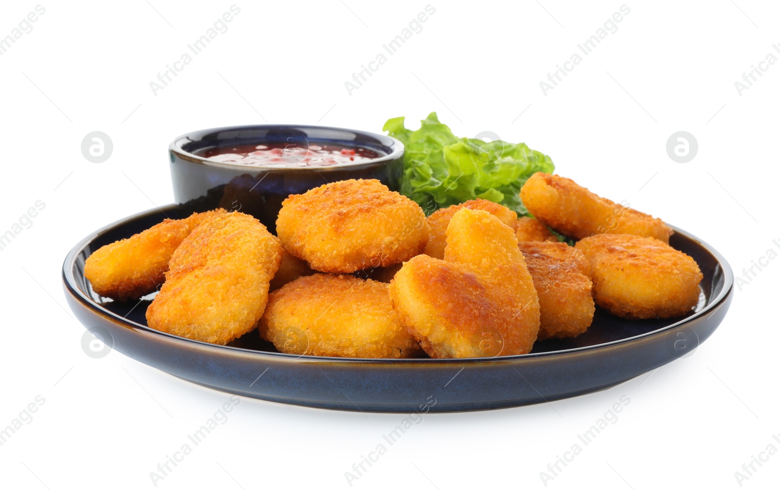 Photo of Tasty chicken nuggets with chili sauce and lettuce isolated on white