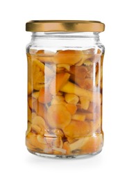 Photo of Tasty pickled mushrooms in jar isolated on white