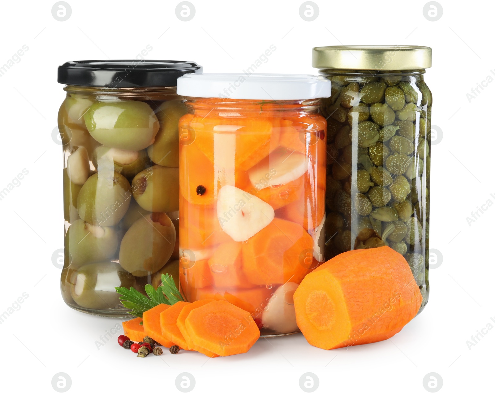 Photo of Different pickled products in jars and fresh ingredients isolated on white