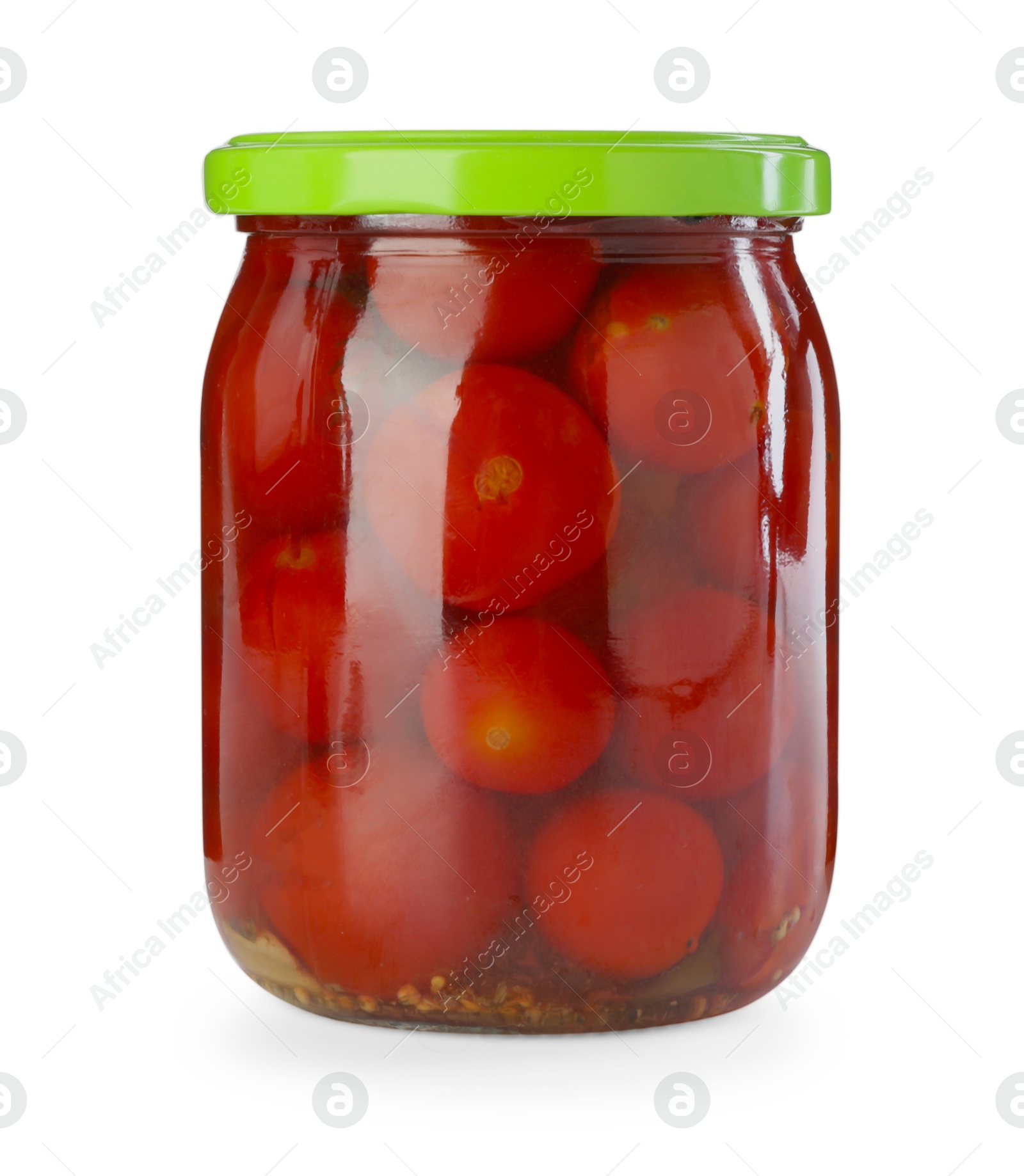 Photo of Tasty pickled tomatoes in jar isolated on white