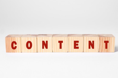 Image of Word Content made of wooden cubes with letters on white background