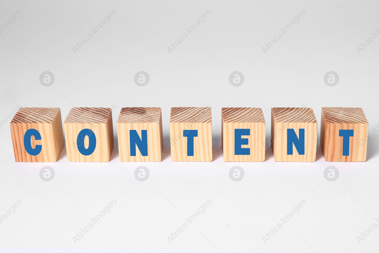 Image of Word Content made of wooden cubes with letters on white background